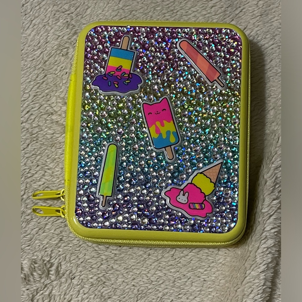 Drippin' Sweets Bling Makeup zip book by Claire’s